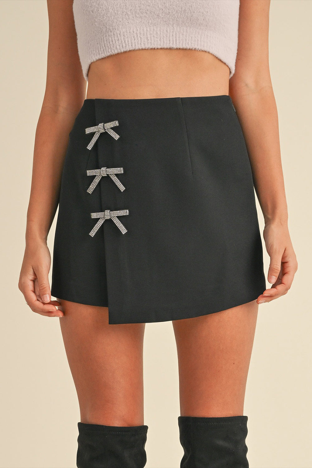 THE BOW WRAP MINI SKIRT