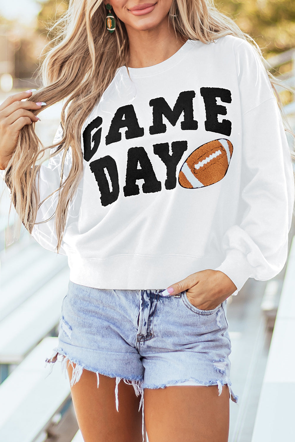 THE FOOTBALL GRAPHIC SWEATSHIRT