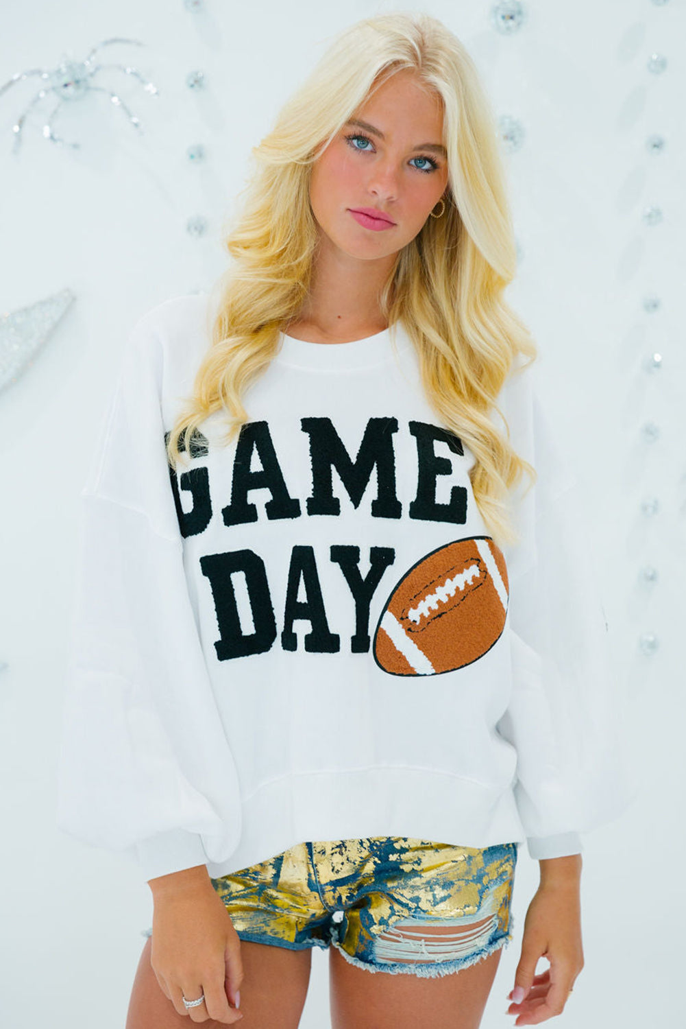 THE FOOTBALL GRAPHIC SWEATSHIRT