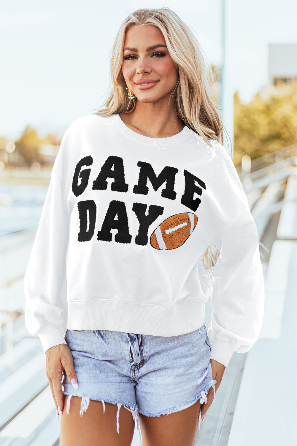 THE FOOTBALL GRAPHIC SWEATSHIRT