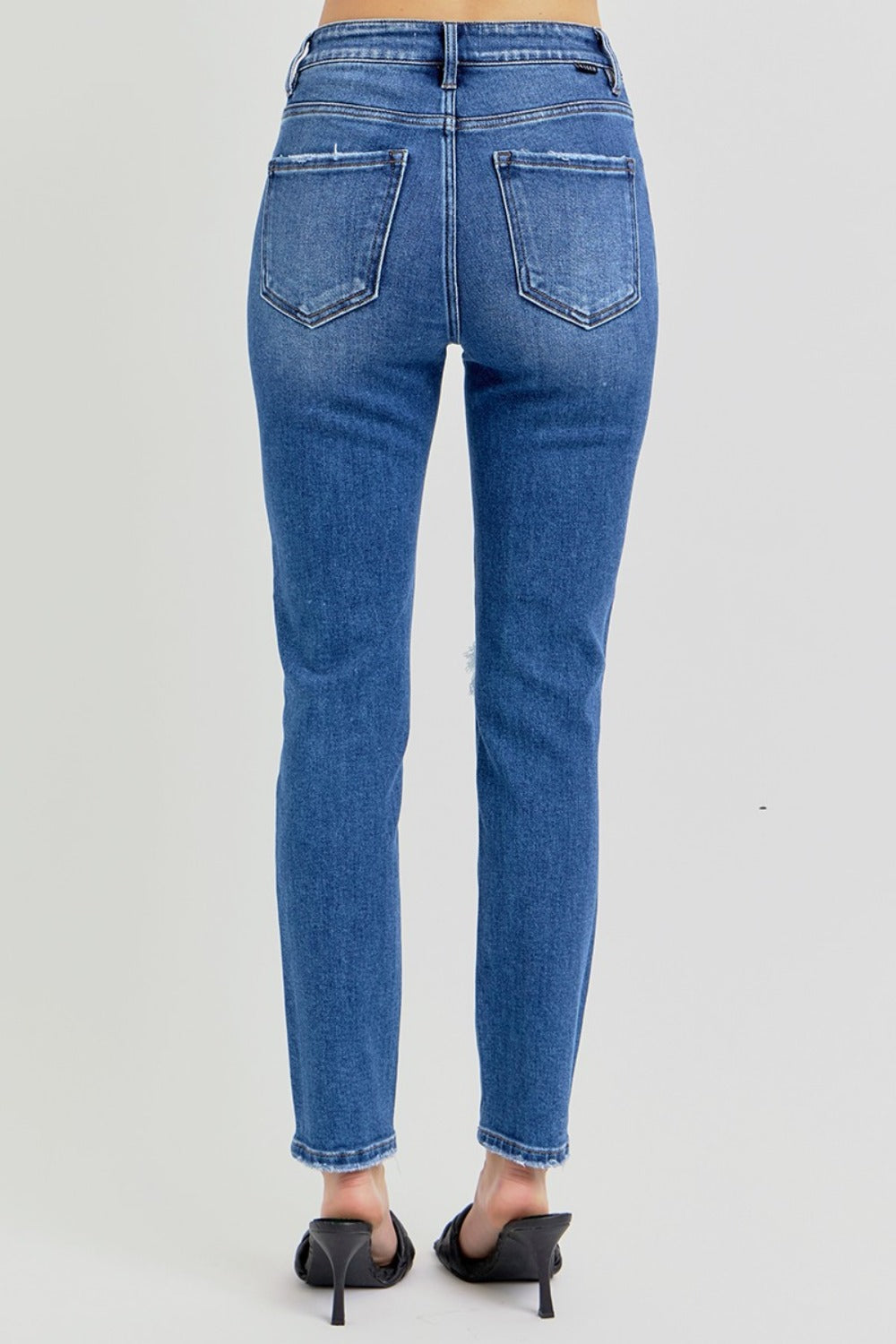 RISEN SKINNY JEANS