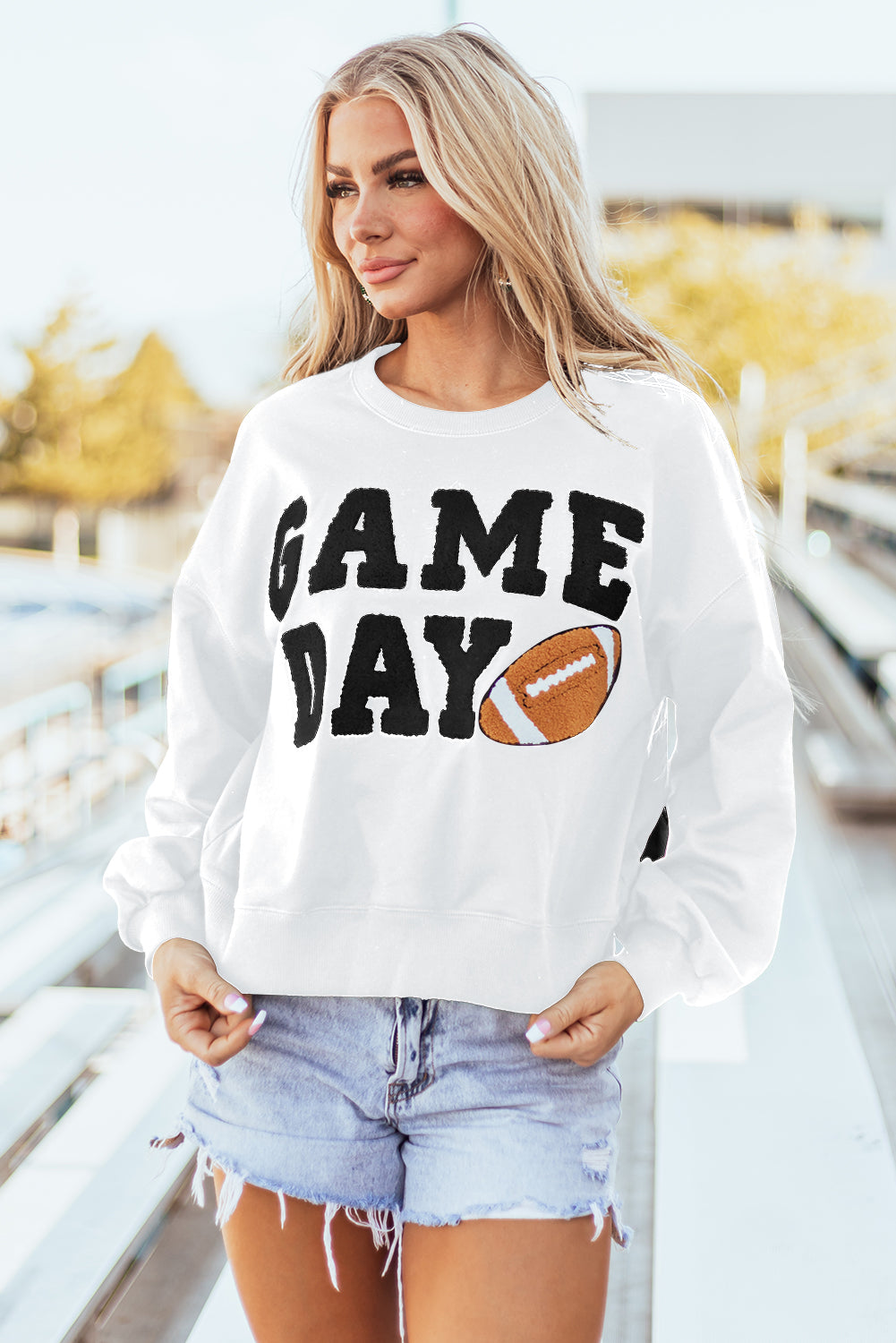 THE FOOTBALL GRAPHIC SWEATSHIRT