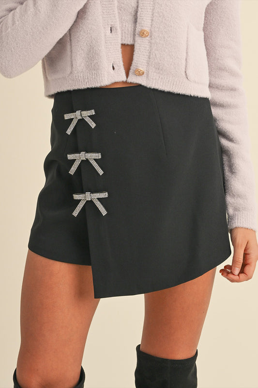 THE BOW WRAP MINI SKIRT