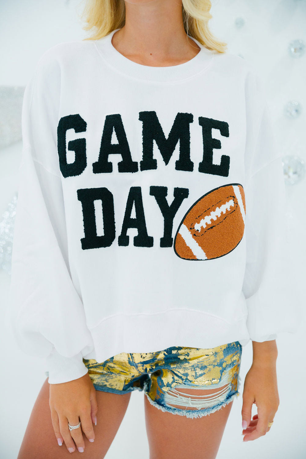 THE FOOTBALL GRAPHIC SWEATSHIRT