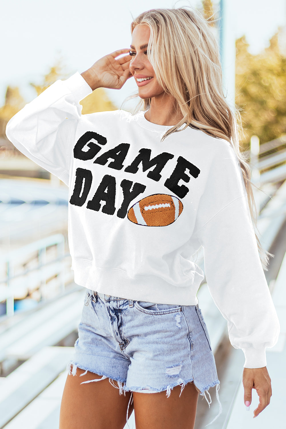 THE FOOTBALL GRAPHIC SWEATSHIRT